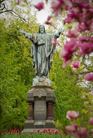 Jesus statue in springtime